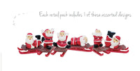 Father Christmas on Sleigh Plastic Cake Topper & Gold Merry Christmas Motto